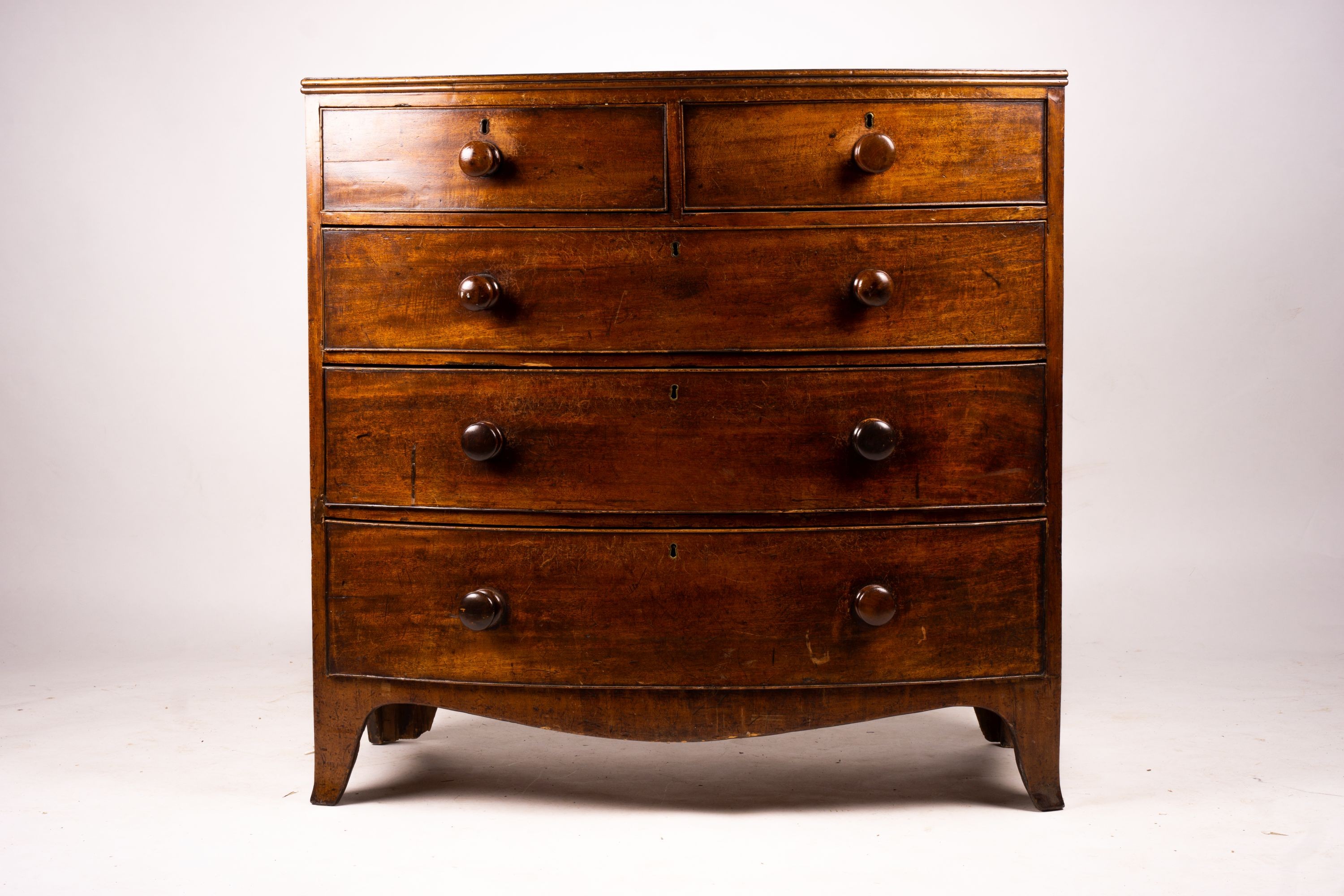 A George IV banded mahogany bowfront chest, width 108cm, depth 57cm, height 105cm